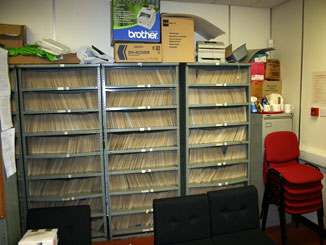huge stock of records in filing cabinet