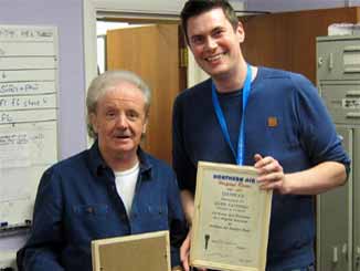 Phil Keen awards David Catterall with Volunteer of the Month